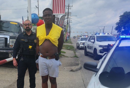 Protestor Arrested for Threatening Business Owner and Possessing Firearms