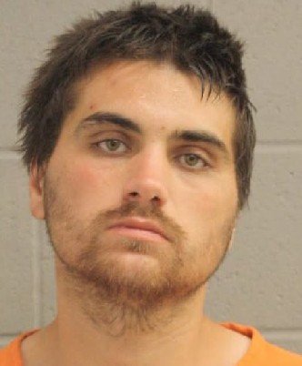 Man Caught with Gun and Meth After Fleeing Deputies Near Burglarized Houston Business