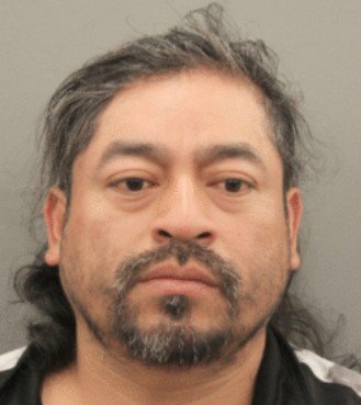 Houston Man Charged with Murder in Fatal Supermarket Shooting, Suspect Remains at Large