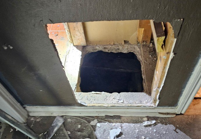 Houston Narcotics Raid Uncovers Drug Operation, Stolen Vehicles, and Hidden Tunnels; Four Arrested