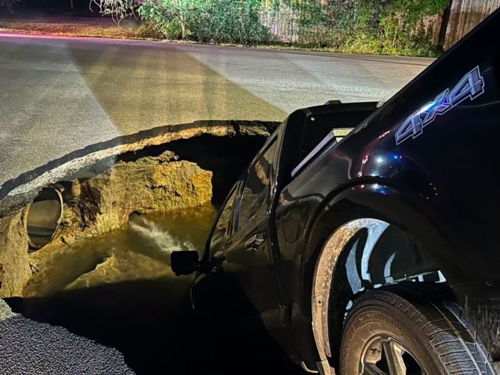 Pickup Truck Swallowed by Massive Sinkhole After Water Main Break in Beaumont