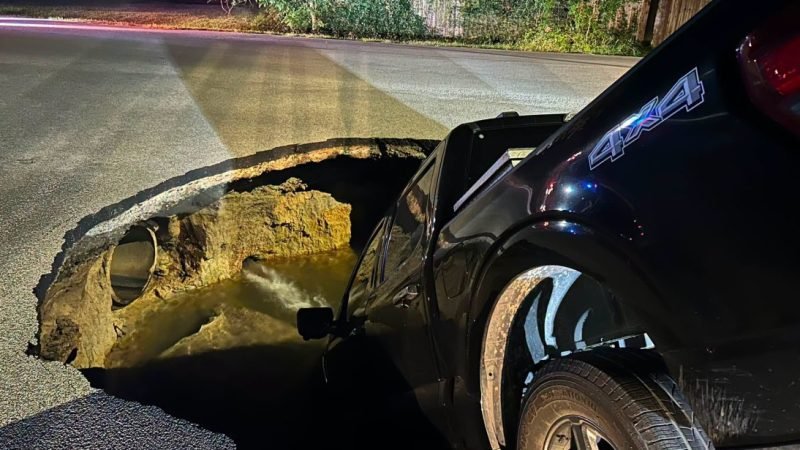 Pickup Truck Swallowed by Massive Sinkhole After Water Main Break in Beaumont